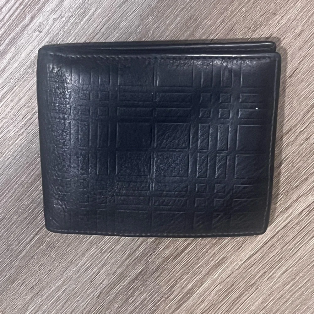 Burberry Embosses Check Bifold Leather Wallet in Black